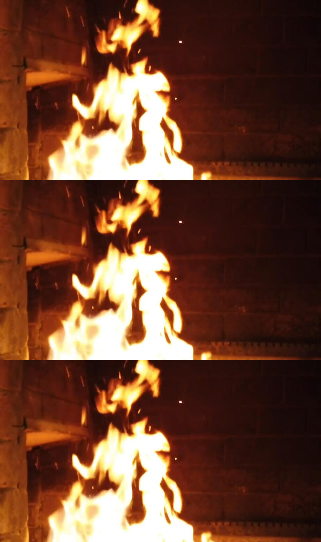 壁炉里的木头燃烧的火焰实拍视频素材