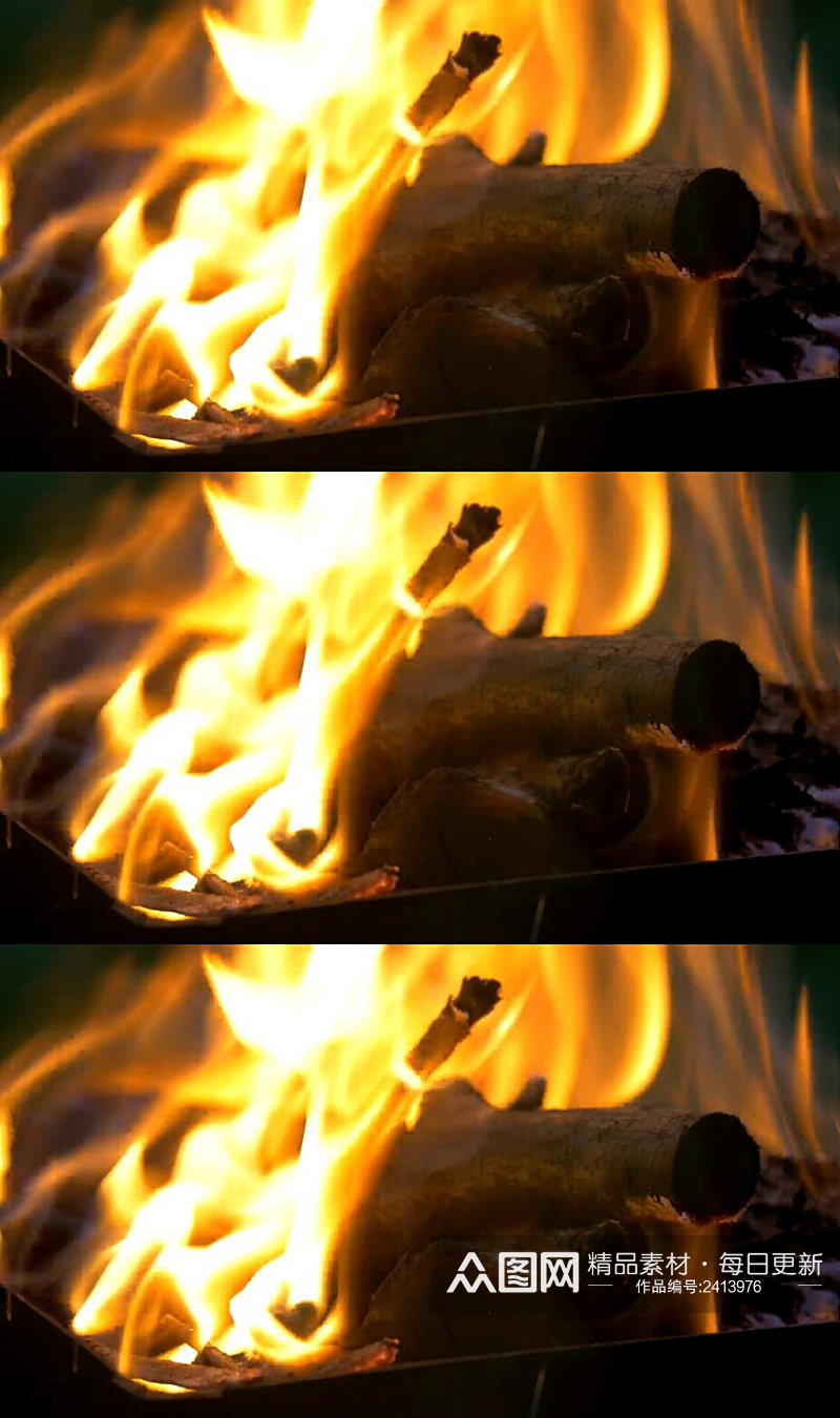 夜晚在篝火中燃烧的原木实拍视频素材