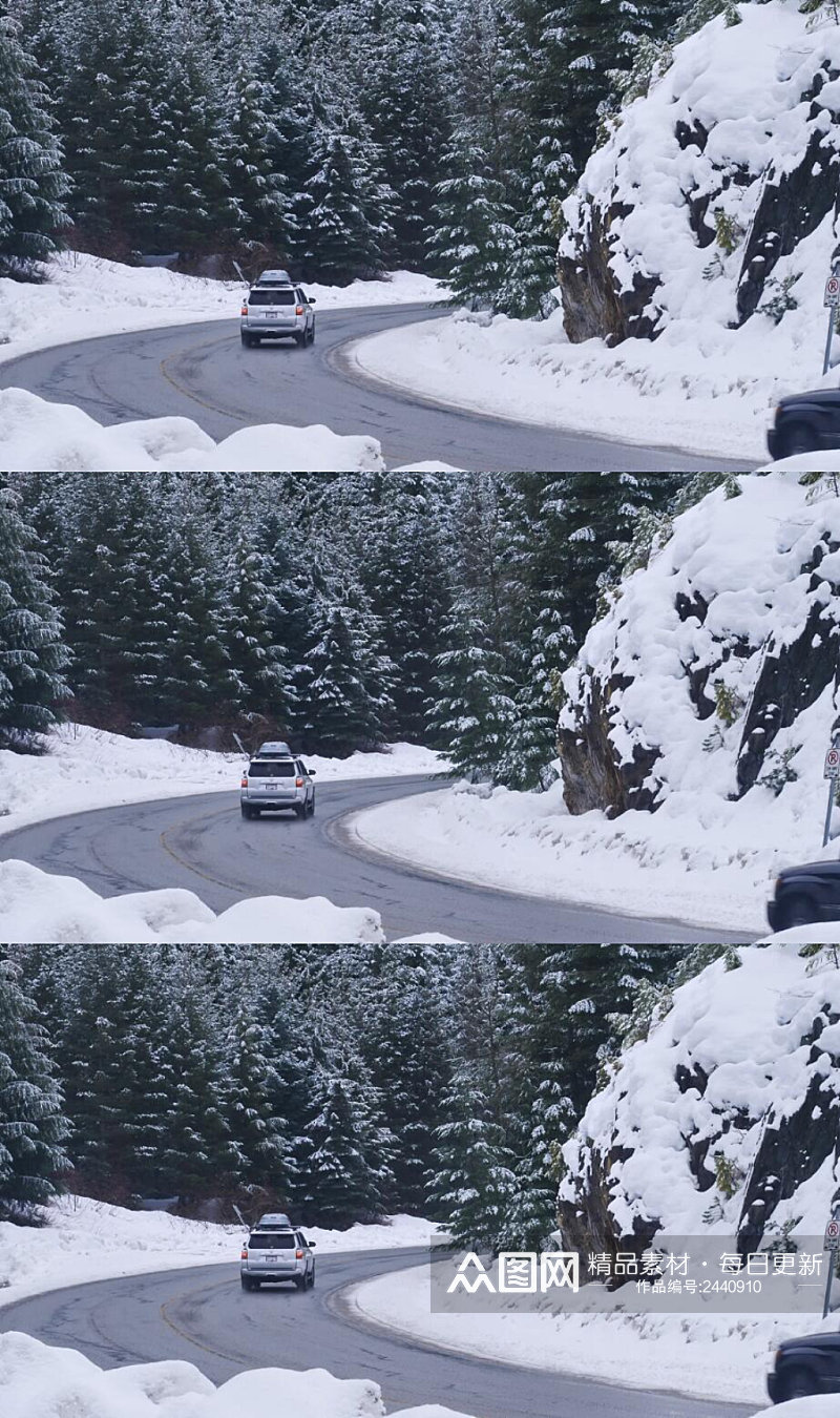 冬季雪林公路上的皮卡车实拍视频素材