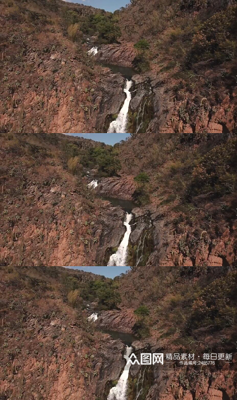 红色岩石上的瀑布景观实拍素材