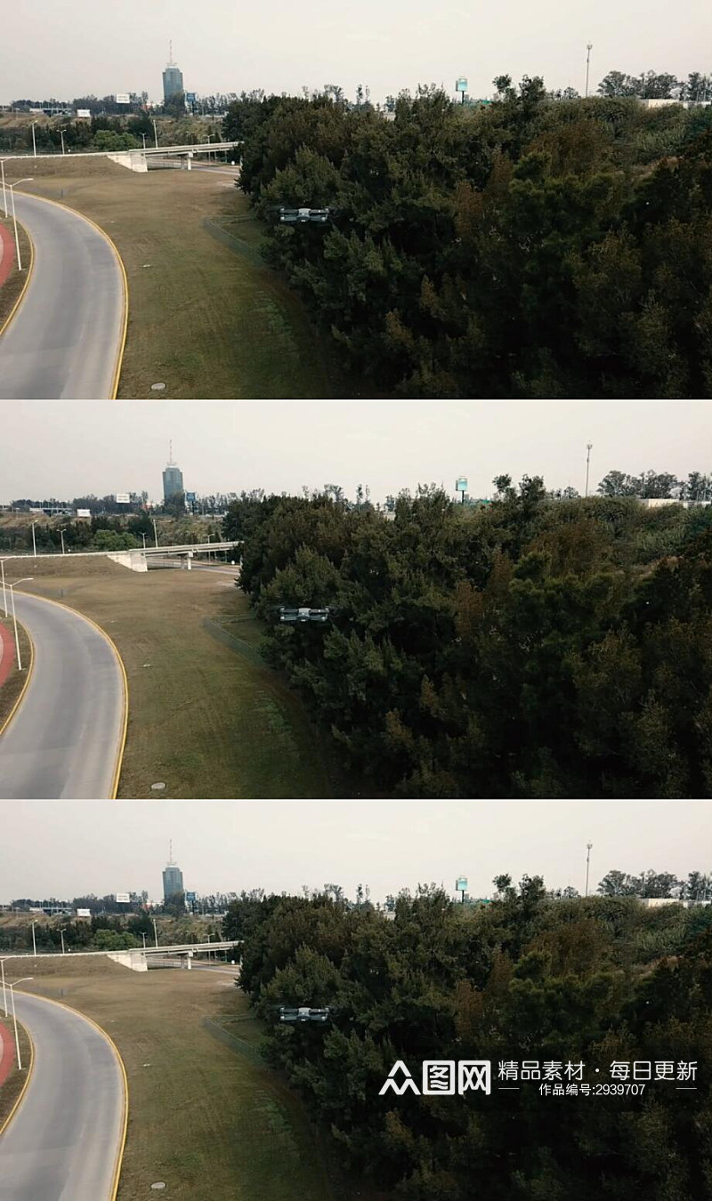 高速公路附近飞行的无人机实拍视频素材