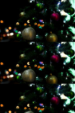 圣诞节散景灯穿过圣诞树实拍视频
