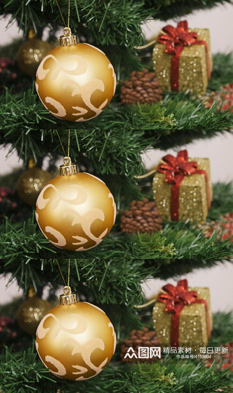 圣诞树上挂金球圣诞礼物实拍视频素材