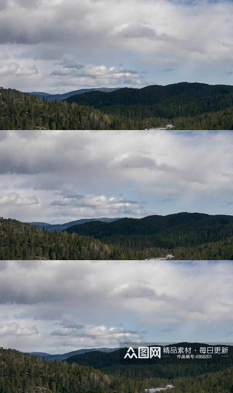 延时摄影白云天空下的森林视频素材