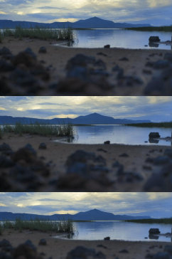 平静的河湖岸边岩石视频素材