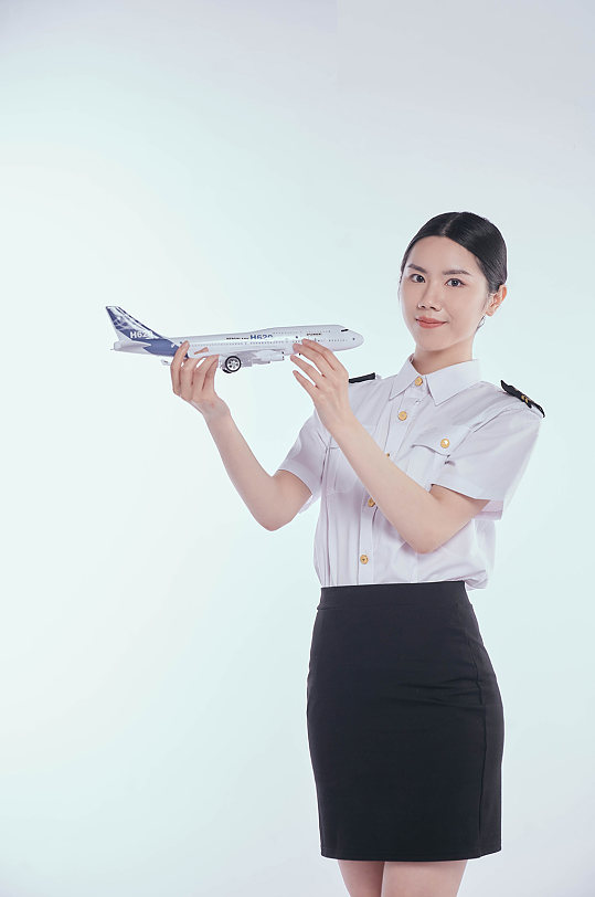 空乘航空人员手持模型展示摄影图元素