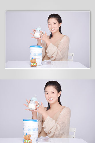 手拿奶瓶冲奶粉饰优雅孕妇人物摄影图