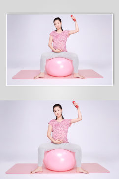 体操球举哑铃运动孕妇瑜伽人物摄影图