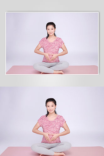比心手势瑜伽孕妇人物摄影图