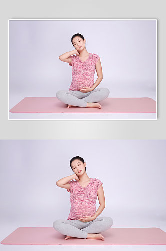 做瑜伽动作孕妇瑜伽人物摄影图