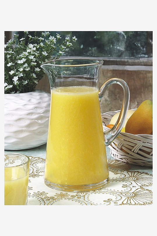 美味芒果汁饮品摄影图片