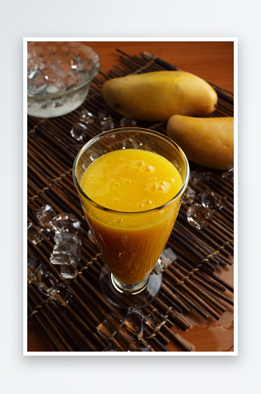 美味芒果汁饮品摄影图片