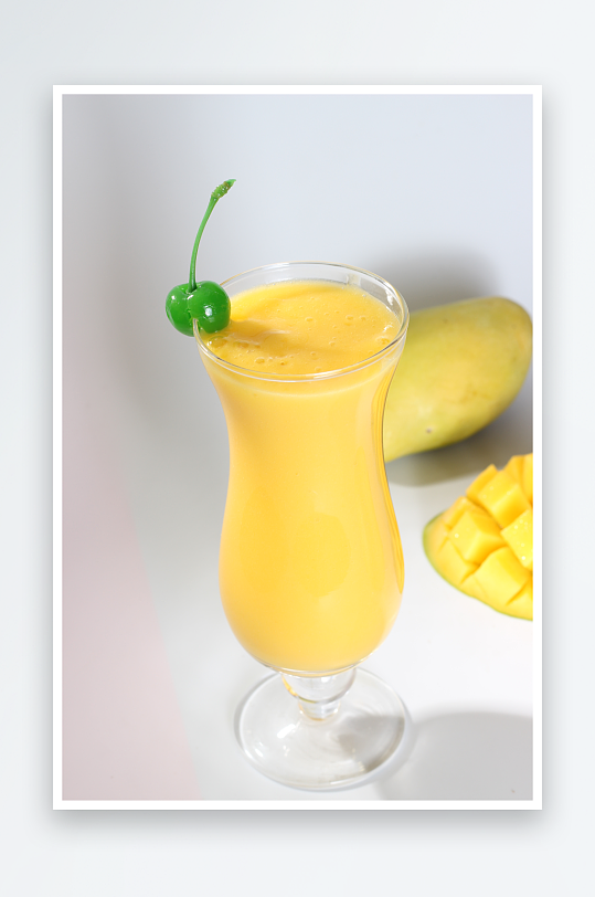 美味芒果汁饮品摄影图片
