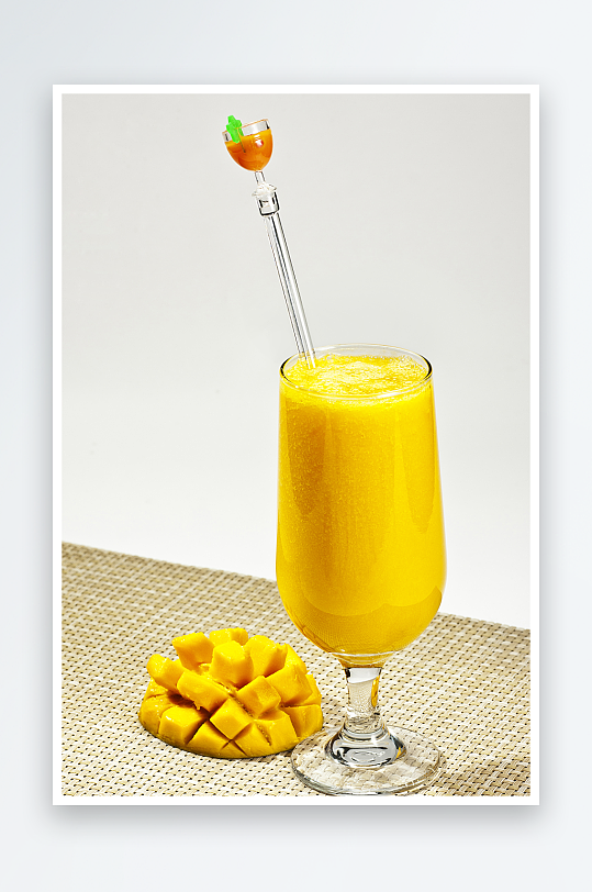 美味芒果汁饮品摄影图片