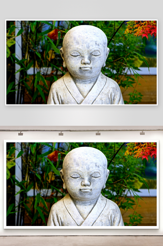 石雕童子静坐绿植环绕-众图网