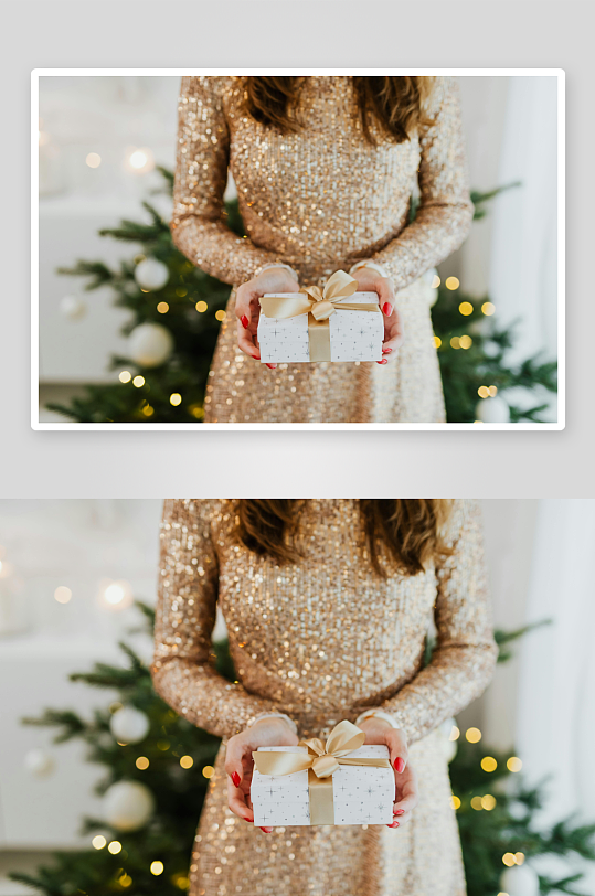 金衣女子手捧圣诞礼盒-众图网