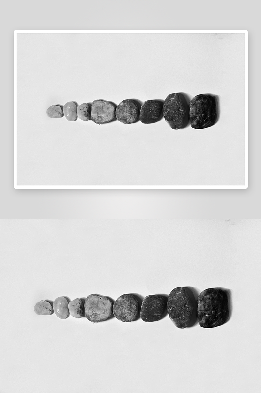 黑白照片中排列的七块石头-众图网