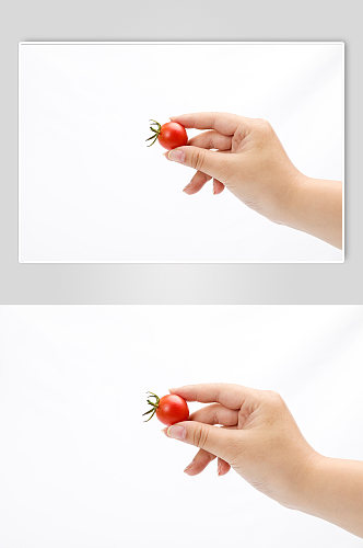 手拿圣女果小番茄水果物品摄影图片