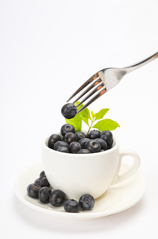 咖啡杯叉子新鲜蓝莓水果物品摄影图片