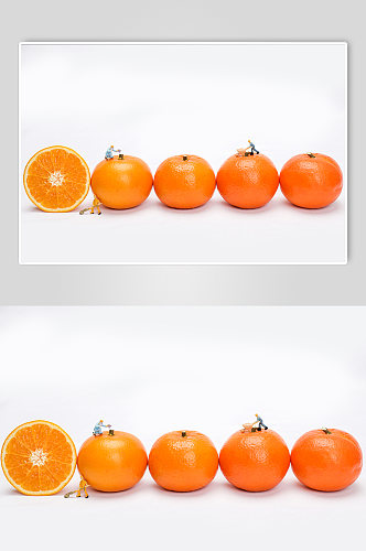 微缩小人工人橙子橘子切片水果物品摄影图片