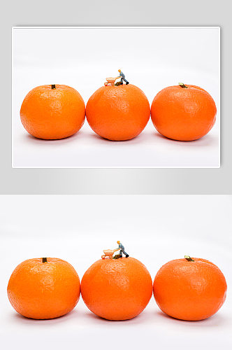 微缩小人工人橙子橘子水果物品摄影图片