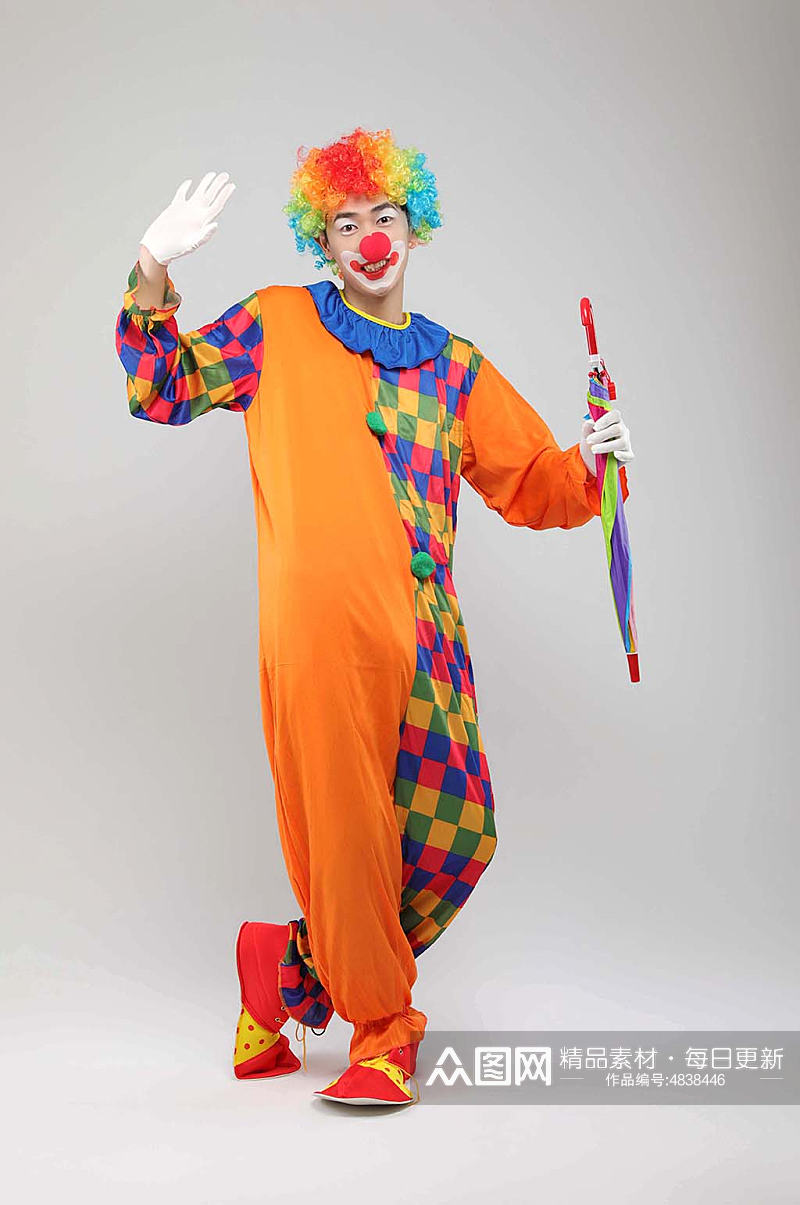 滑稽橘色小丑人物摄影图片素材
