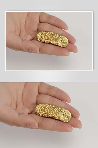 手放一排铜币货币金融贸易摄影图片