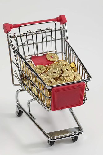 购物车装铜币黄铜锁货币金融贸易摄影图片