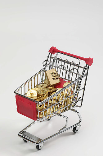 购物车装铜币黄铜锁货币金融贸易摄影图片