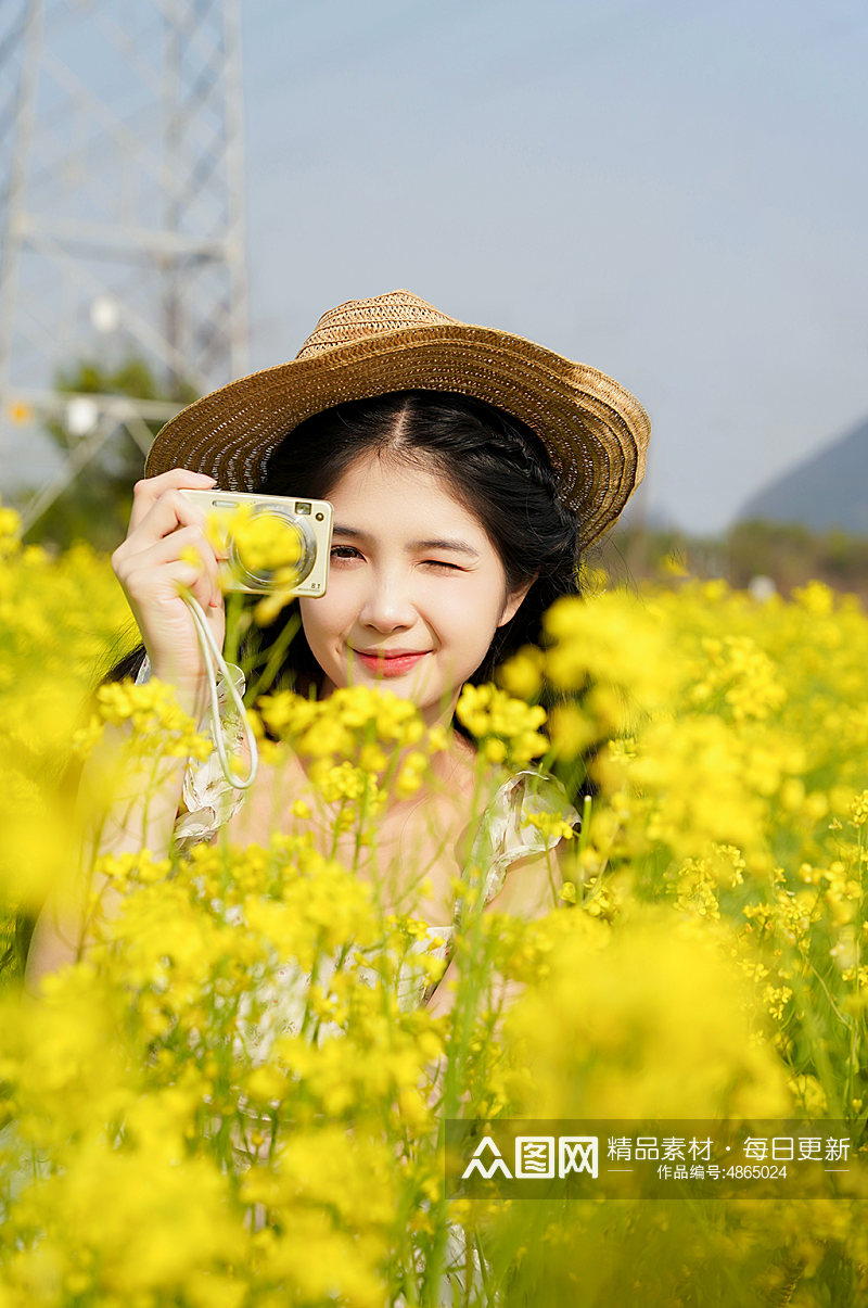 遮阳帽清新少女春季花季油菜花人物摄影图片素材