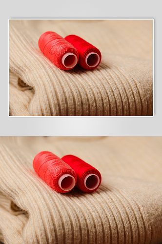 极简毛衣红色绣花线特写母亲节物品摄影图片