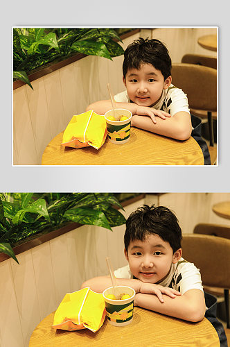 小朋友六一儿童节吃零食人物摄影图片