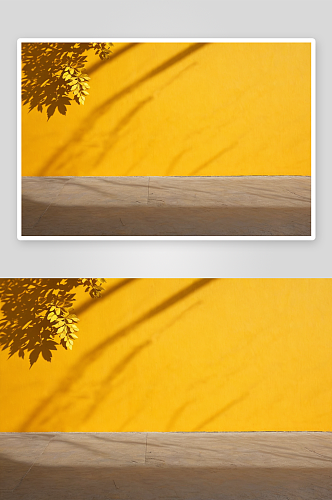 叶子影子黄色墙背景图片