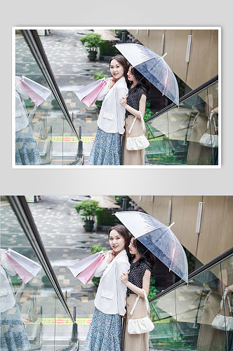 大气职业女性商场逛街雨伞购物人物摄影图
