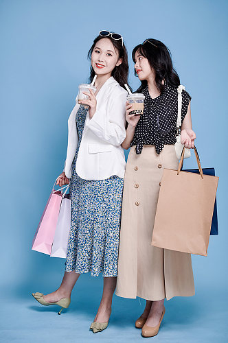 职业女性双人奶茶电商购物人物摄影图