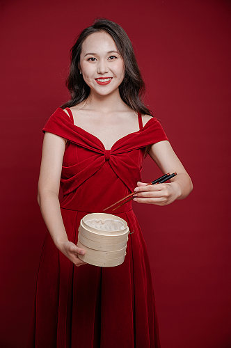 喜庆红裙女生新年美食购物人物摄影图
