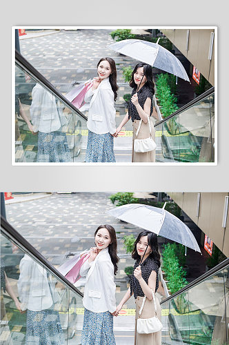 碎花裙美女雨伞逛街购物人物摄影图照片