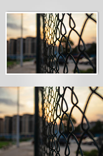 晚霞高清足球场围栏背景图摄影图照片