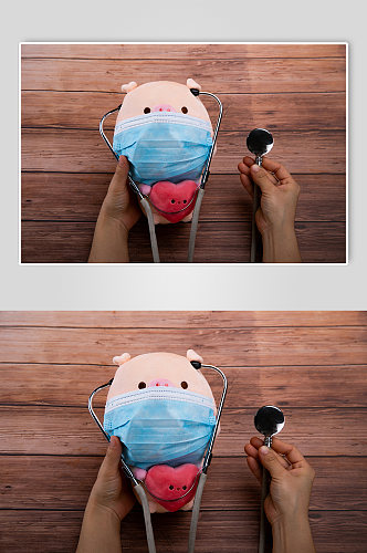 毛绒玩具小猪听诊器防疫西医物品摄影图片