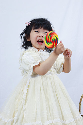 大棒棒糖小女孩快乐儿童节人物摄影图照片