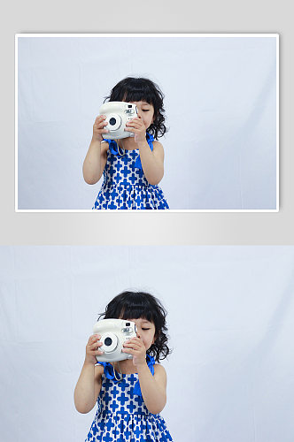 小女孩相机玩具拍照儿童节人物摄影图照片