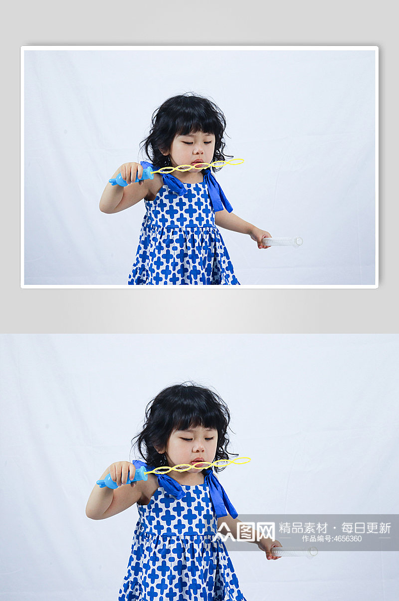蓝裙子小女孩吹泡泡儿童节人物摄影图照片素材