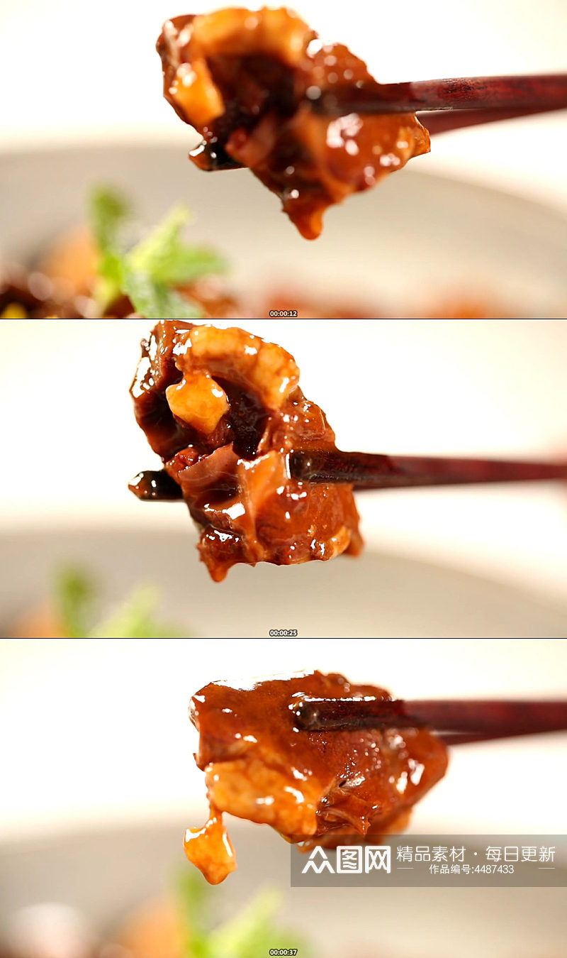 筷子夹起一块红酒牛肉素材