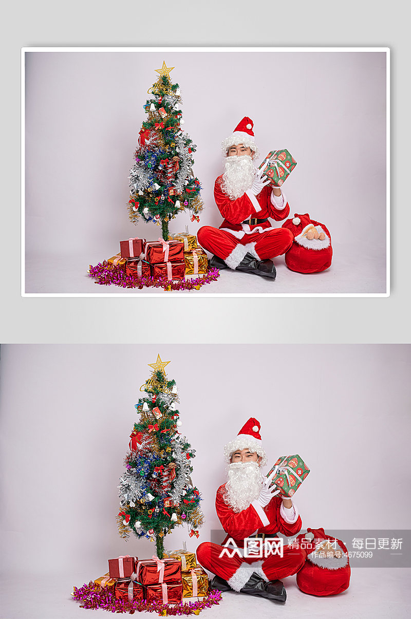 圣诞节圣诞老人双手托举礼物盒人物摄影图素材