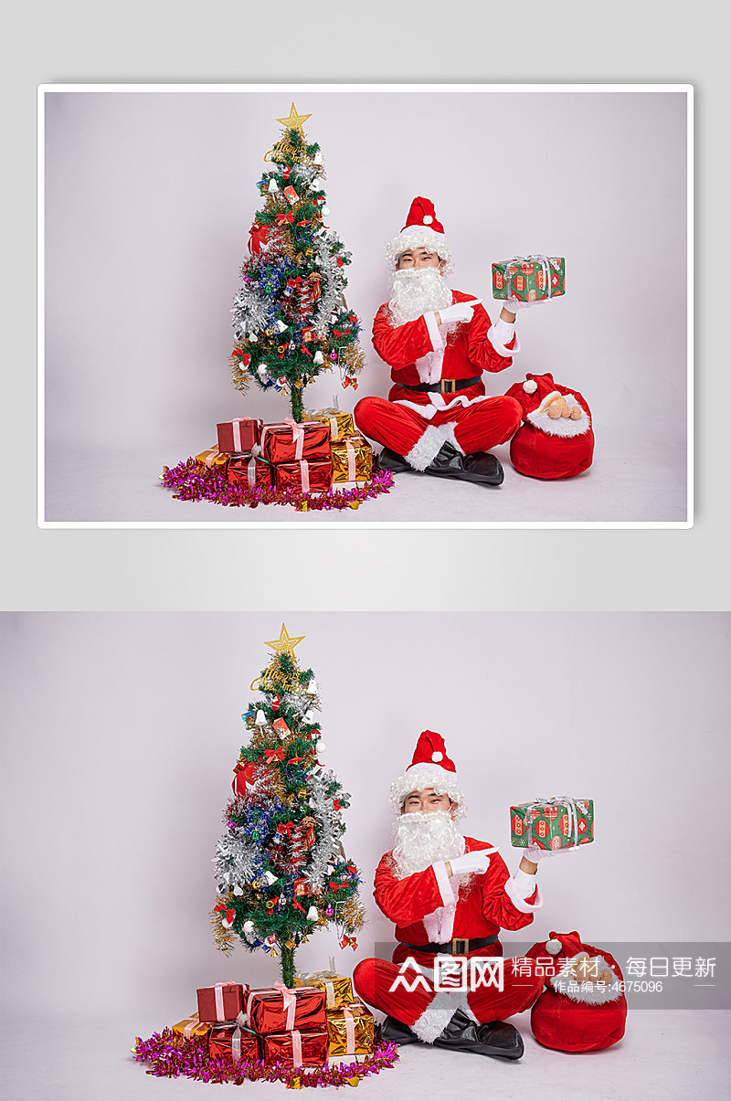 圣诞老人单手托举礼物盒人物摄影图素材