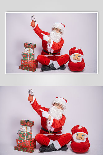 圣诞节圣诞老人拿小罐子人物摄影图
