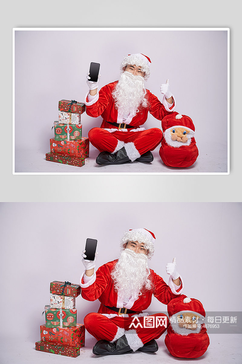 圣诞节圣诞老人拿手机人物摄影图素材