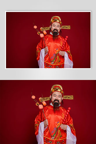 新年财神爷手拿糖葫芦柿子人物摄影图