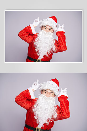 圣诞节可爱圣诞老人胜利手势人物摄影图