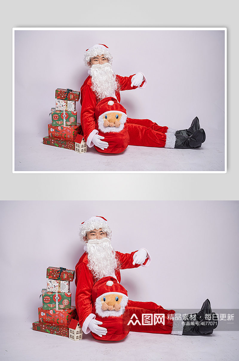 圣诞节圣诞老人坐着手抱礼物人物摄影图素材